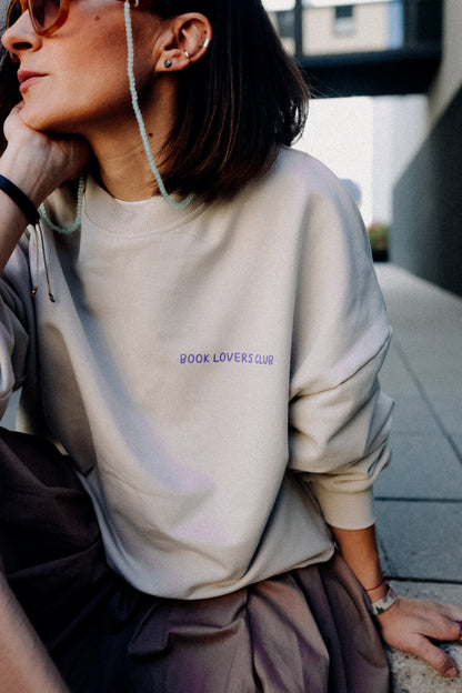 BIG LILA BOOK LOVER AUF CREME - ERWACHSENEN SWEATSHIRT