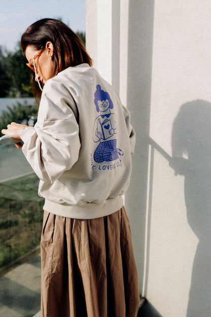 BIG LILA BOOK LOVER AUF CREME - ERWACHSENEN SWEATSHIRT
